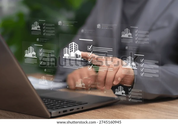 Business professional managing a real estate portfolio with digital property management tools