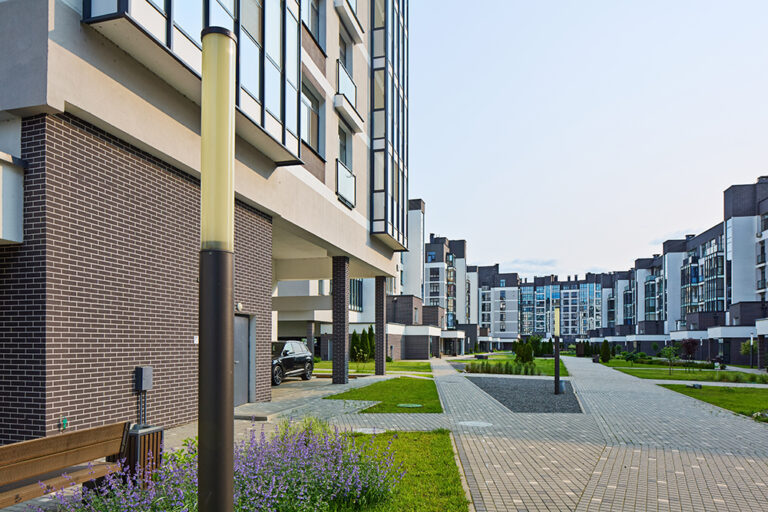New modern block of flats in green area. residential apartment with flat buildings exterior. luxury house complex. Part of City Real estate property, condo architecture. apartment insurance concept.